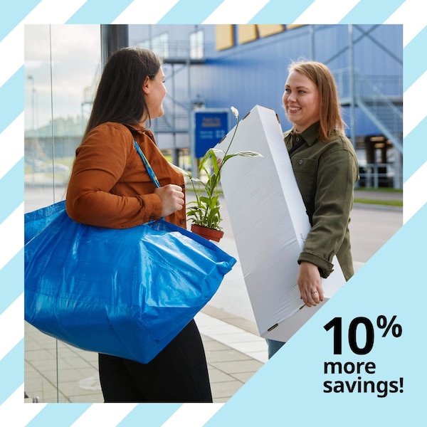 10% more savings! two people holding packages and talking